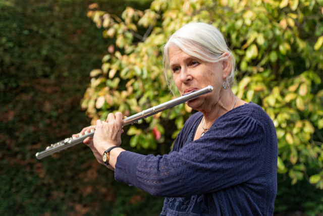 Ann Wright playing the flute