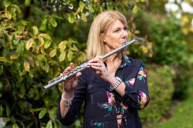 Julie Dearden playing the flute